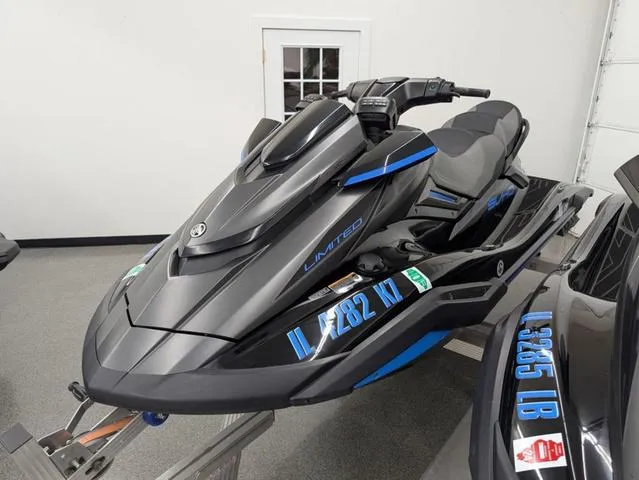 Slide: The Image of 2020 Yamaha WaveRunner FX Limited SVHO in showroom, sleek black and blue design. - 4