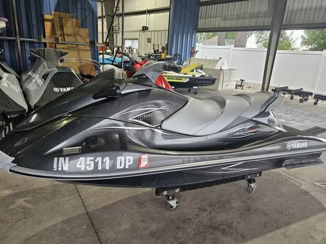 Slide: The Image of 2013 Yamaha WaveRunner VX jet ski in a storage facility. - 1