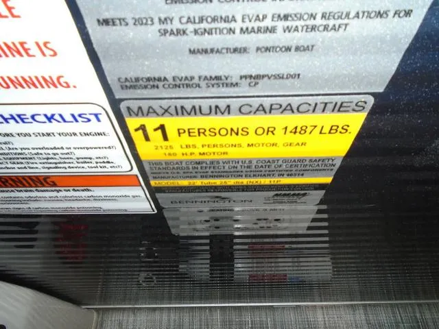 Slide: The Image of Capacity label on 2023 Bennington 23 SXSR pontoon boat, max 11 persons or 1487 lbs. - 18