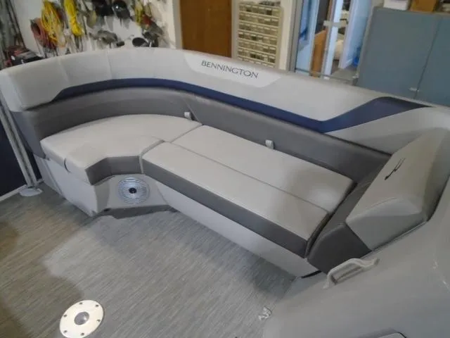 Slide: The Image of 2023 Bennington 23 SXSR boat interior with gray seating and modern design. - 20