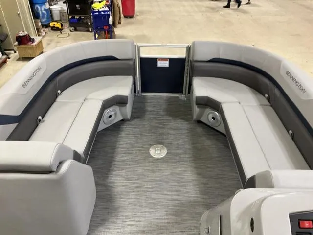 Slide: The Image of 2023 Bennington 23 SXSR pontoon boat interior with gray seating and spacious layout. - 7