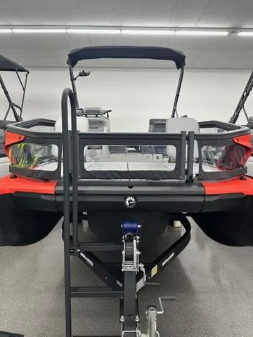 Slide: The Image of 2023 Sea-Doo Switch® Sport 21-230 hp boat on display in showroom. - 2