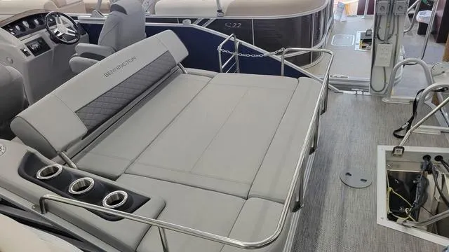 Slide: The Image of 2023 Bennington 23 LSB boat interior with spacious seating and cup holders. - 11