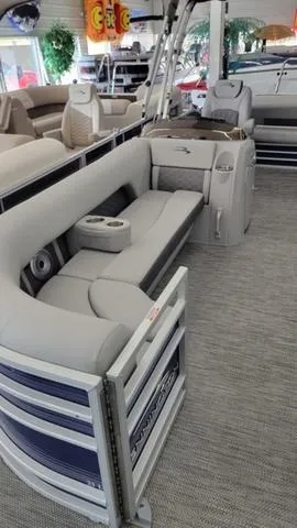 Slide: The Image of 2023 Bennington 23 LSB pontoon boat interior with plush seating and modern design. - 17