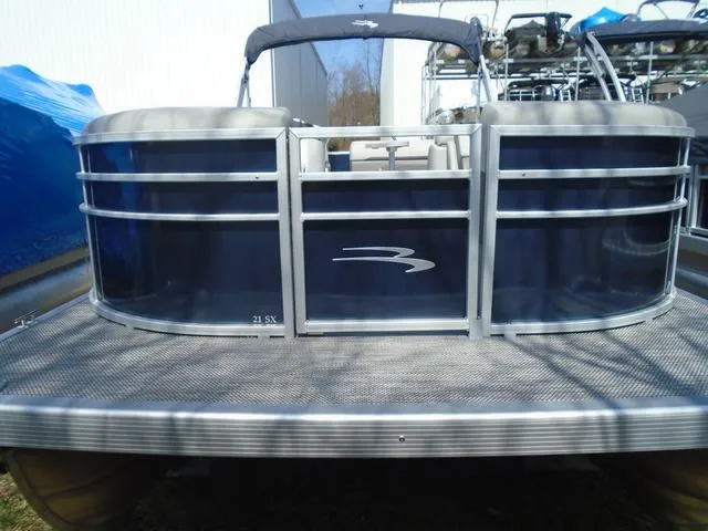 Slide: The Image of 2024 Bennington 21 SXL pontoon boat with sleek design and spacious deck. - 7