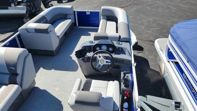 Slide: The Image of 2024 Bennington 20 SVL pontoon boat interior with helm and seating. - 2
