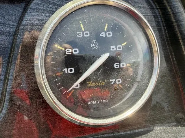 Slide: The Image of Close-up of a 2021 Godfrey Pontoons SW 2086 C tachometer displaying RPM. - 13