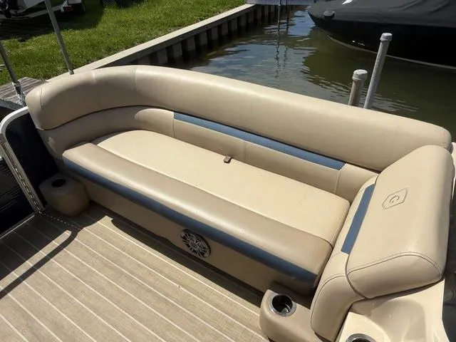 Slide: The Image of 2021 Godfrey Pontoons SW 2086 C boat seating, beige upholstery, docked by water. - 5