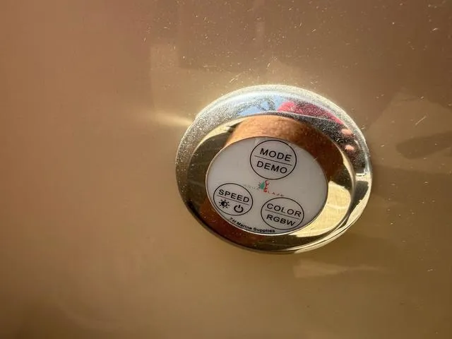 Slide: The Image of Control panel on 2021 Godfrey Pontoons SW 2086 C, featuring mode, speed, and color settings. - 9