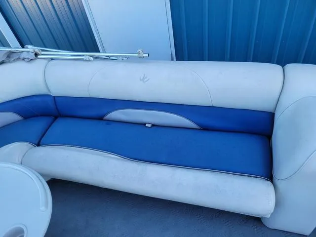 Slide: The Image of 2008 JC MFG Neptune 23 boat seating with blue and white upholstery. - 8