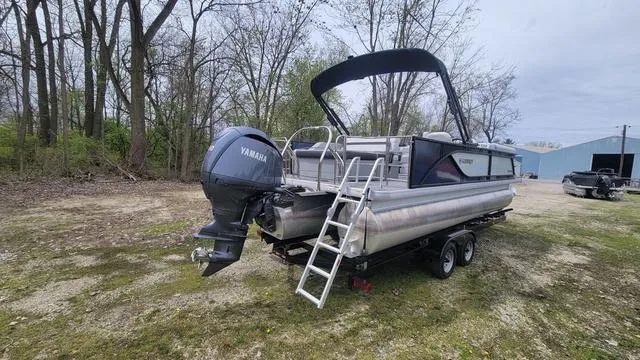 Slide: The Image of 2024 Godfrey Pontoons Sweetwater 2286 SFL with Yamaha engine, parked outdoors. - 11