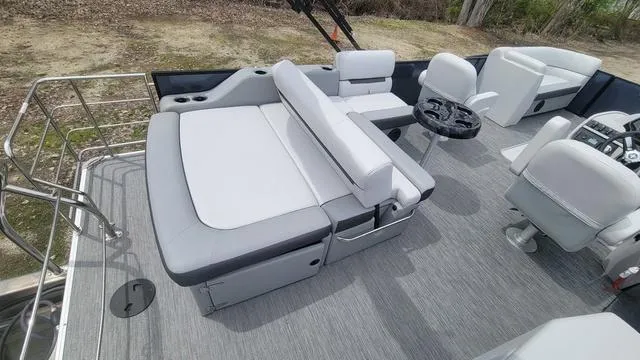 Slide: The Image of 2024 Godfrey Pontoons Sweetwater 2286 SFL interior with plush seating and modern design. - 9