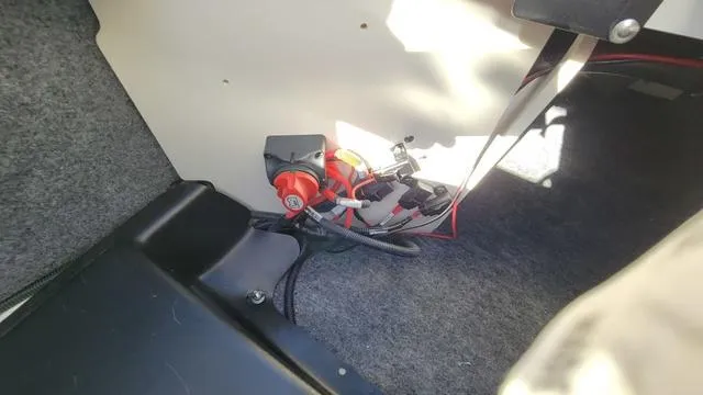 Slide: The Image of 2022 Yamaha AR210 boat interior wiring and components detail. - 16