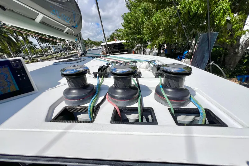 Slide: The Image of Sailing yacht cockpit with steering wheel, winches, and navigation display, Balance 482, 2021 model. - 113