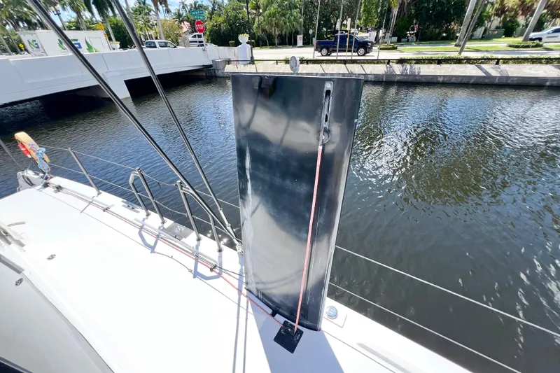 Slide: The Image of Sailboat navigation system on Balance 482, 2021 model, with tropical palm trees in the background. - 115