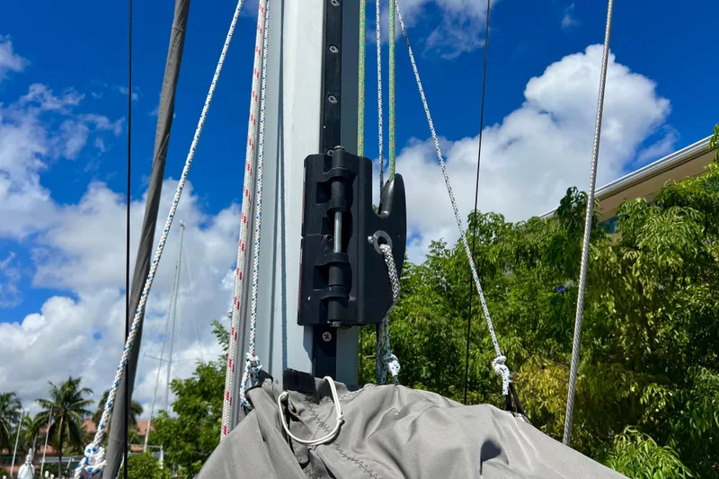 Slide: The Image of 2021 Balance 482 yacht cockpit with steering wheel, navigation controls, and winches. - 117