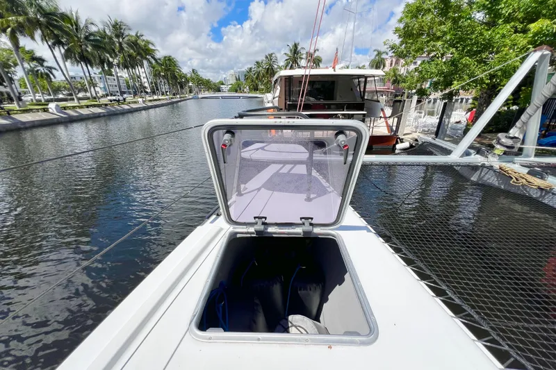 Slide: The Image of Close-up of Balance 482 catamaran deck with netting and metal fittings, 2021 model. - 127