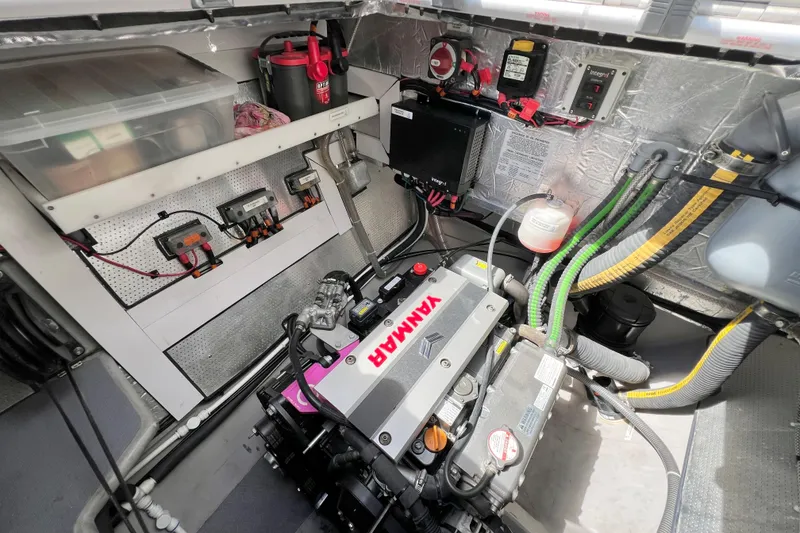 Slide: The Image of Open storage compartment in Balance 482 boat, revealing snacks and drinks inside. - 140