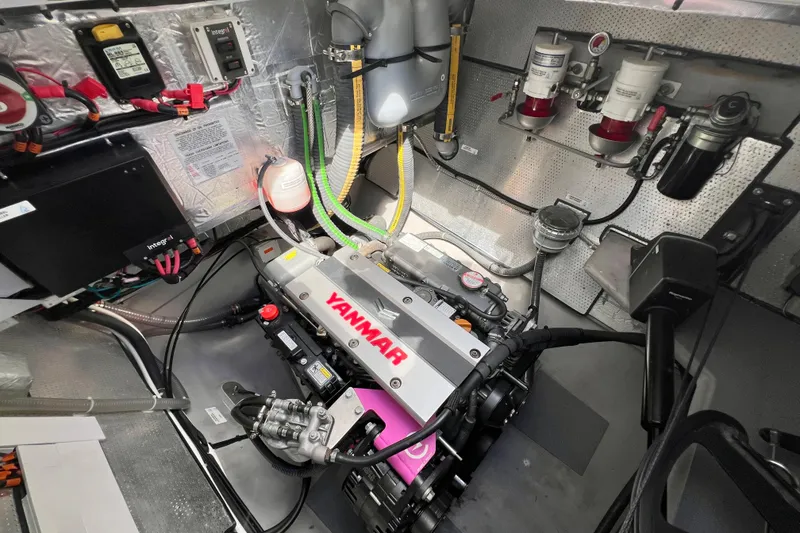 Slide: The Image of Storage compartment on a 2021 Balance 482 boat, containing various boxed items. - 141