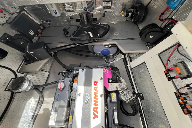 Slide: The Image of Engine room of Balance 482 yacht, featuring Yanmar engine and organized wiring, 2021 model. - 145