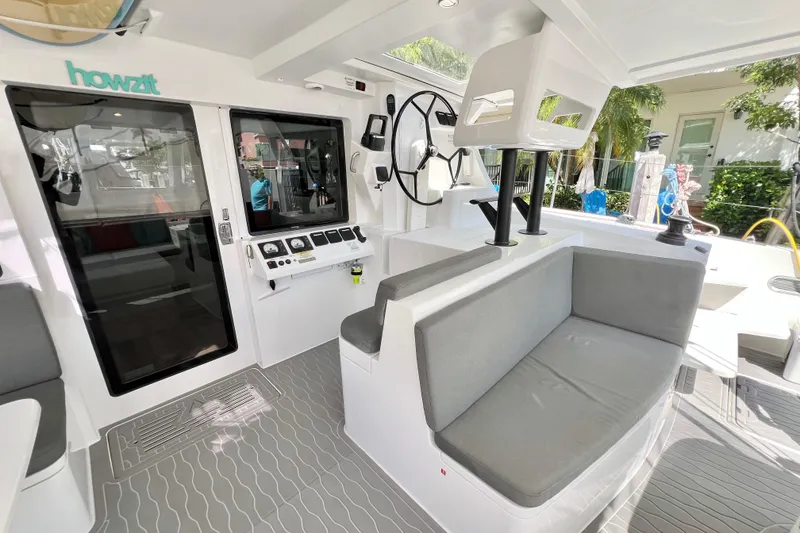 Slide: The Image of Spacious interior of 2021 Balance 482 catamaran with modern seating and navigation area. - 30
