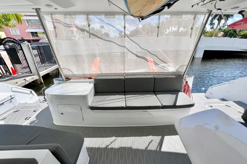Slide: The Image of Modern Balance 482 yacht interior with sleek seating and table, 2021 model. - 31