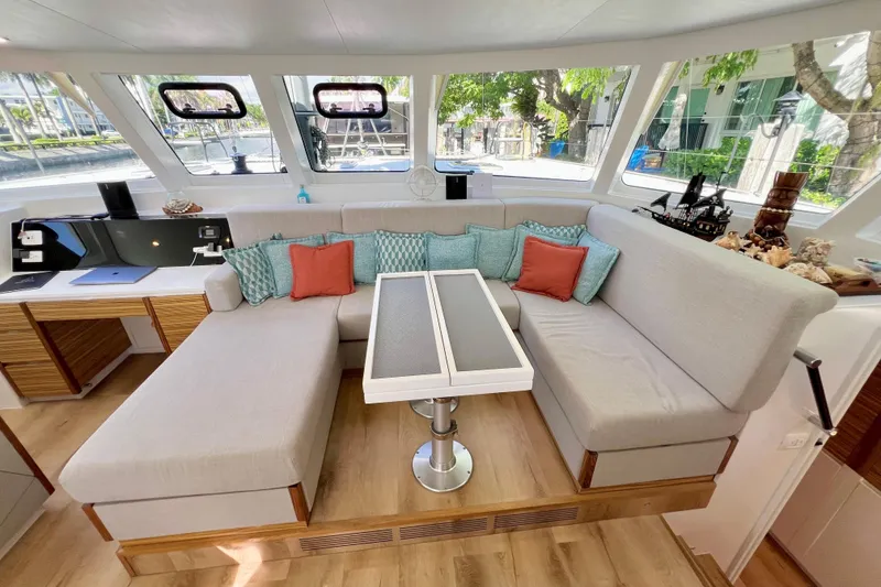 Slide: The Image of Modern Balance 482 yacht interior with sleek kitchen, seating, and helm, 2021 model. - 43