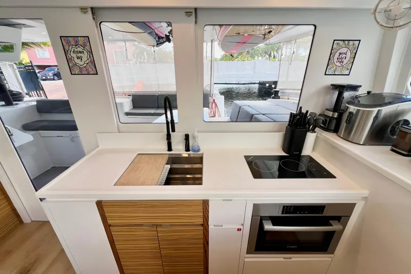 Slide: The Image of Luxurious interior of 2021 Balance 482 yacht with modern kitchen and cozy seating area. - 50