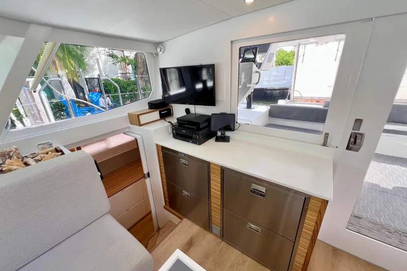 Slide: The Image of Modern kitchen interior on a 2021 Balance 482 yacht, featuring sleek appliances and stylish decor. - 55