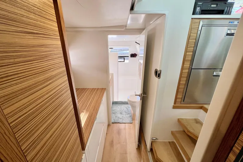 Slide: The Image of Modern kitchen with stainless steel appliances, Balance 482 model, 2021, featuring wood accents. - 59