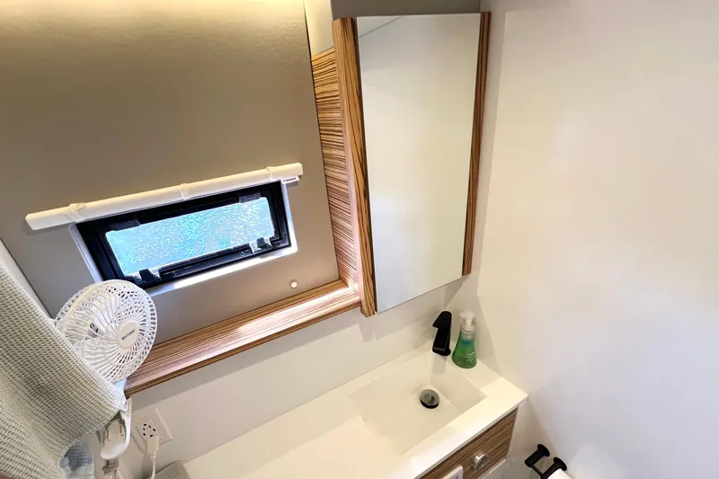 Slide: The Image of Compact RV interior with bathroom and cozy bedroom, Balance 482 model, 2021. - 80