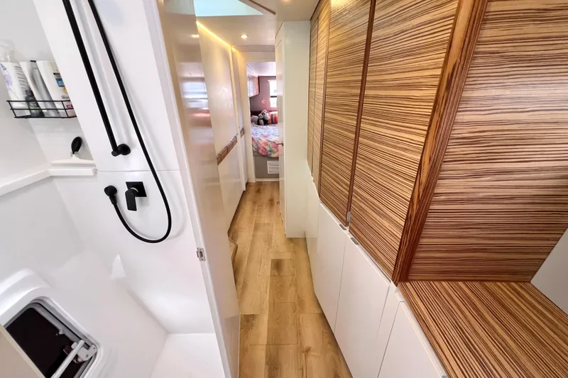 Slide: The Image of Compact bathroom in 2021 Balance 482, featuring modern fixtures and wood accents. - 84