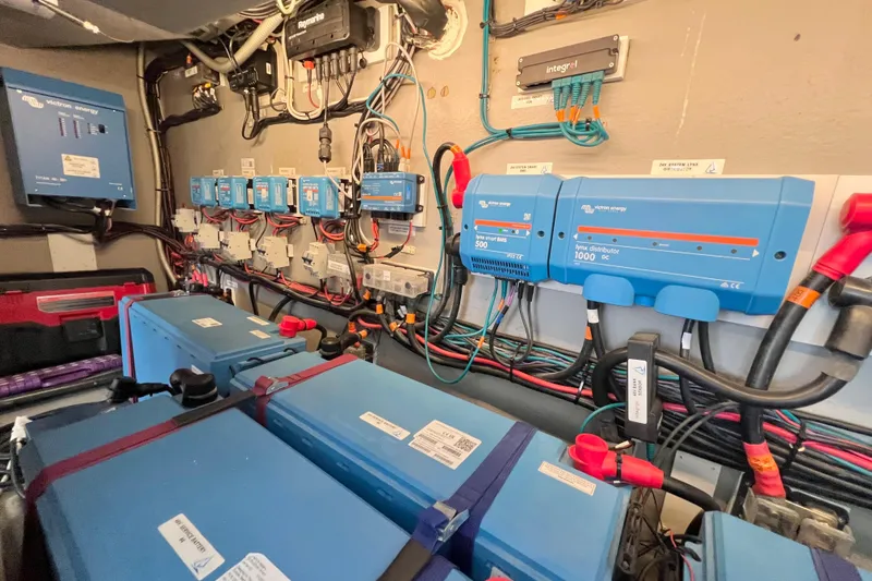 Slide: The Image of Modern interior of 2021 Balance 482 catamaran with wood accents and cozy sleeping area. - 93