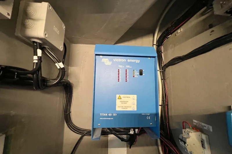 Slide: The Image of Electrical system setup in a Balance 482 model, featuring wiring and components, 2021. - 95