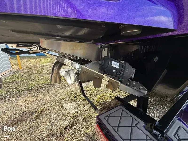 Slide: The Image of 2022 Tigé Z3 boat underside showing exhaust and mechanical components. - 15