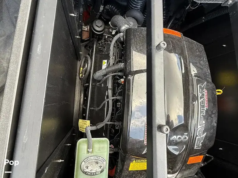 Slide: The Image of Engine compartment of a 2022 Tigé Z3 boat, featuring a Raptor 400 motor. - 17