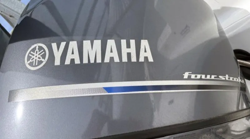 Slide: The Image of Yamaha four-stroke engine on 2015 Hurricane SunDeck Sport 188 OB boat. - 15