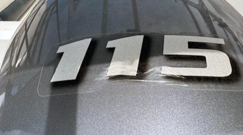 Slide: The Image of Close-up of 115 decal on 2015 Hurricane SunDeck Sport 188 OB boat. - 16