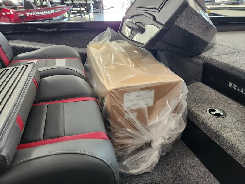 Slide: The Image of 2025 Ranger RT198P boat interior with packaged box on seat. - 19