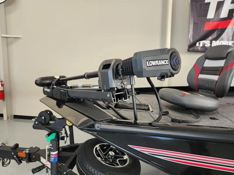 Slide: The Image of 2025 Ranger RT198P boat with Lowrance trolling motor in showroom. - 4