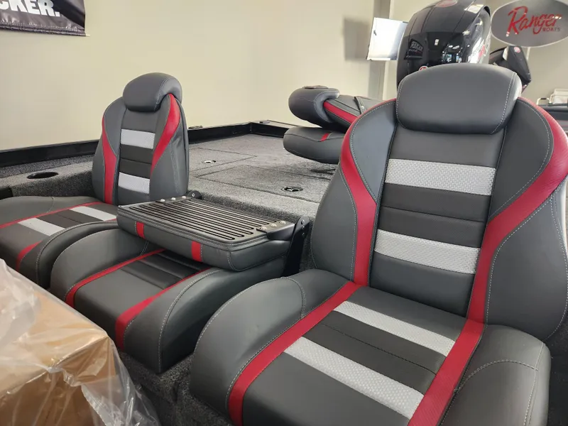 Slide: The Image of 2025 Ranger RT198P boat seats with red and gray accents, showcasing modern design. - 8