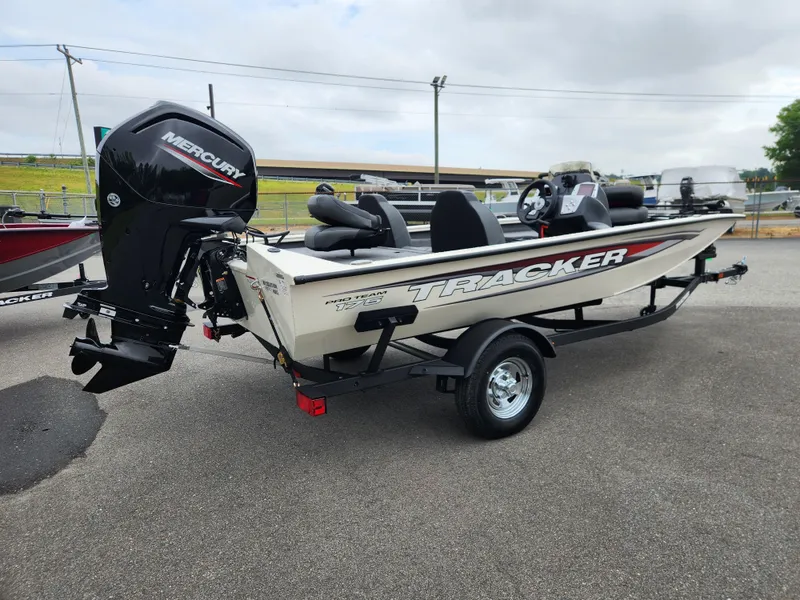 Slide: The Image of 2025 Tracker Pro Team 175 boat with Mercury engine on trailer. - 2