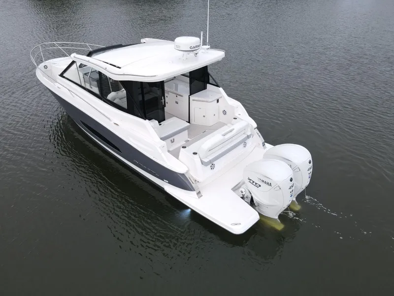 Slide: The Image of 2026 Regal 36 XO boat on water, featuring dual Yamaha outboard engines. - 3