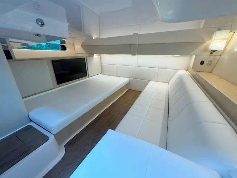 Slide: The Image of Luxurious interior of 2026 Regal 36 XO yacht with white seating and modern design. - 34
