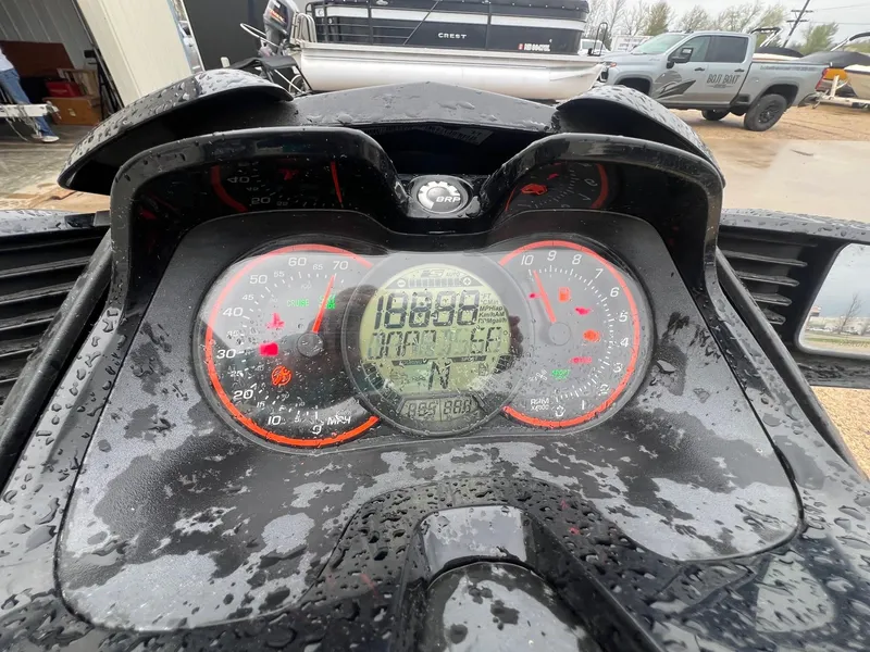 Slide: The Image of Dashboard of a 2014 Sea-Doo Wake Pro 215, displaying speedometer and controls. - 7