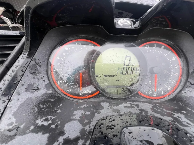 Slide: The Image of Close-up of 2014 Sea-Doo Wake Pro 215 dashboard with raindrops. - 8