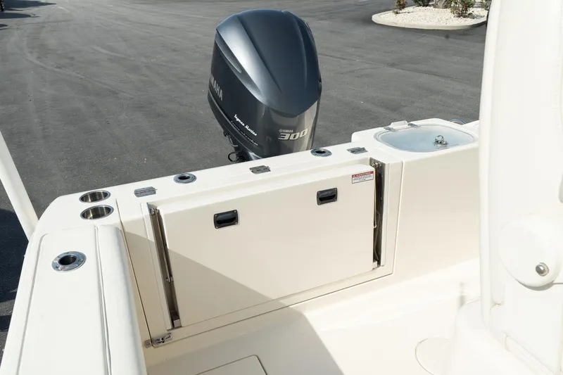 Slide: The Image of 2019 Cobia 240 Center Console boat with Yamaha 300 outboard motor, rear deck view. - 8