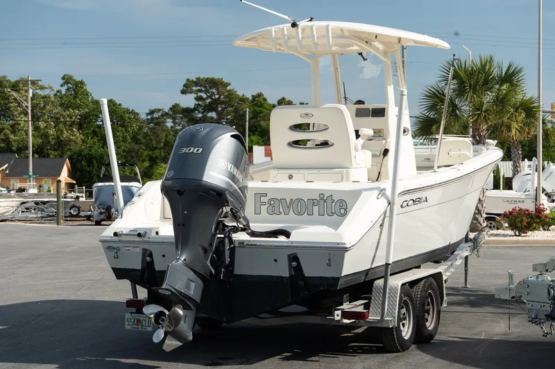 Slide: The Image of 2019 Cobia 240 Center Console boat on trailer with Yamaha 300 engine. - 9