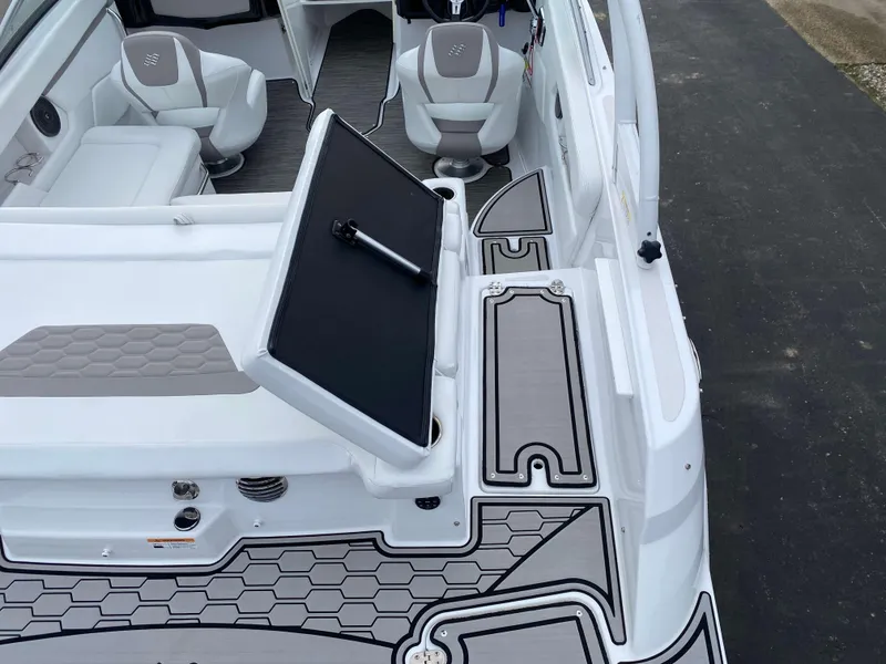 Slide: The Image of 2022 Four Winns HD2 Surf boat interior with stylish seating and modern design. - 4