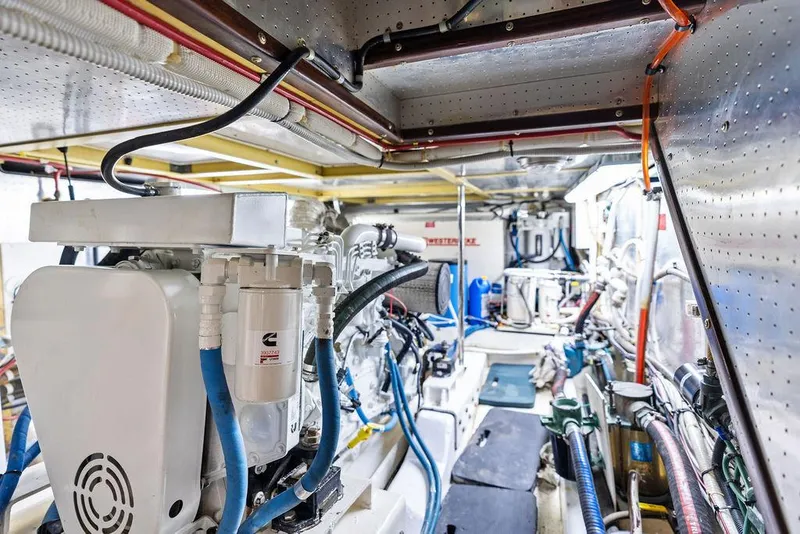 Slide: The Image of Engine room of 2000 Selene Solo yacht, showcasing complex machinery and wiring. - 34